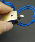 5N 12V DC Push Pull Open Frame Solenoid Electromagnet With Built In Mounting Board Miniature Spring Loaded Actuator For ATM Machines Vending Heavy Duty Industrial Use, metal body with blue wires