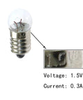 E10 mini bulb close-up showing slick screw base and markings; Pack Of Ten Heavy Duty E10 Mini Bulbs Featuring Slick Screw Bases Emitting A Sweet Warm Yellow Ray At 1.5 Volts.