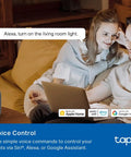 Couple using Smart Light Switch With Matter Compatibility with voice command via Alexa on a digital assistant device.