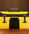 Yellow toolbox with 2 Pieces Elastic Rubber Hood Latches With Stainless Steel Brackets, showcasing secure closure on dark background.