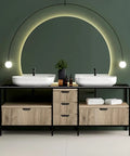 Modern bathroom vanity with dual sinks and under-cabinet storage, featuring minimalist lighting and sleek design.