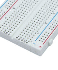 Close-up of 10 Piece Breadboard Kit With 830 Point Solderless Prototyping Boards MB 102 for Arduino Projects and DIY Electronics Starter Pack.