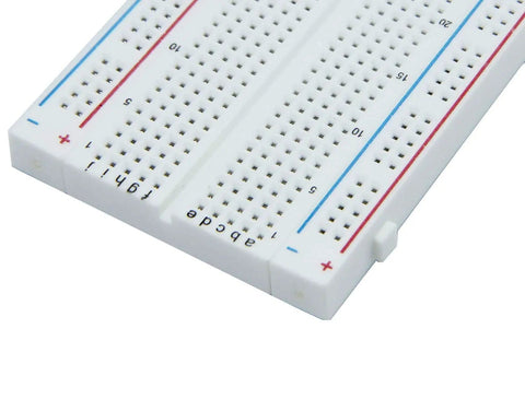 Close-up of a breadboard with 400 tie points from 16 Piece Breadboard Kit With 400 Tie Points Solderless Prototyping PCBs For Arduino DIY Projects.