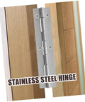 Close-up of stainless steel piano hinge installed on a wooden cabinet door.