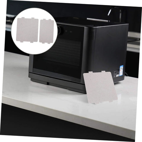 Microwave Oven Mica Sheets 10 Pieces Heat Resistant Mica Flakes Replacement Kit Universal Fit shown with a microwave on a counter