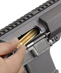 Inserting Laser Bore Sighter For 223 5.56mm Rifles Red Dot Boresighter With Batteries Caliber Specific Gauge into rifle chamber