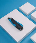 Easycut Cutter Knife With Self Retracting Safety Tipped Blade And Adjustable Length Dial Retractable Edge Guides For Box Tops Built In Blade Storage Includes Three Replacement Blades Black Blue on white box