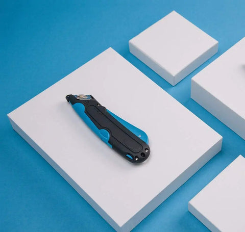 Easycut Cutter Knife With Self Retracting Safety Tipped Blade And Adjustable Length Dial Retractable Edge Guides For Box Tops Built In Blade Storage Includes Three Replacement Blades Black Blue on white box