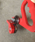 Close-up of red 9 Inch Manual Sheet Metal Nibbler Handheld Pull Cutter for Steel and Aluminum, showing cutting blades and handle.