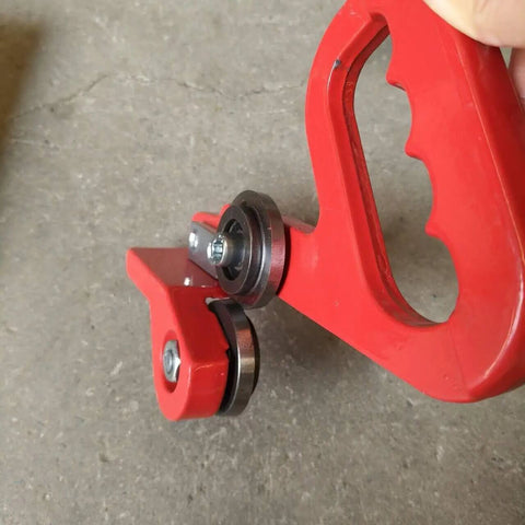Close-up of red 9 Inch Manual Sheet Metal Nibbler Handheld Pull Cutter for Steel and Aluminum, showing cutting blades and handle.