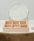 Six Compartment Pine Wood Jewelry Tray, Rustic Desktop Catch All For Rings And Necklaces on a vanity with pearls organized.