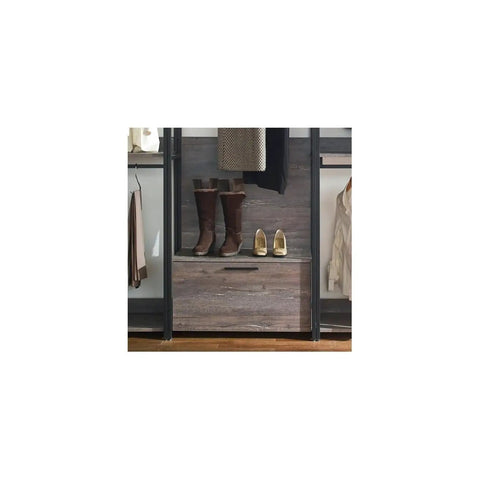 Heavy Duty Wood Walk In Closet Organizer System With Customizable Shelving And Rustic Gray Finish featuring a storage drawer and boots.