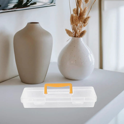 Straight Up Plastic Tool Box With Sturdy Carry Handle Divided Multi Purpose Compartments For Weekend DIY Projects Hardware Sorting Paint Brush Holder And Small Gear on a table with decorative vases.