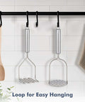 Two Pack Stainless Steel Potato Masher Set With Zigzag Wire And Flower Shaped Hole Heads hanging on kitchen wall hooks