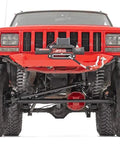 Beefed Up Steering Kit With 1.5 Inch DOM Tie Rod And Drag Link For Jeep Cherokee XJ And Wrangler TJ Built For Four Inch Or More Lift For Rugged Off Road Use installed on lifted Jeep front axle