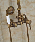 UMJIGF 8 Inch Antique Shower System with Hot and Cold Water Shower Combo Set Multifunction Single Handle Shower Faucet Set with Top Fall Shower Head, Handheld Shower,Type B,Type C close-up of bronze shower faucet with handheld attachment