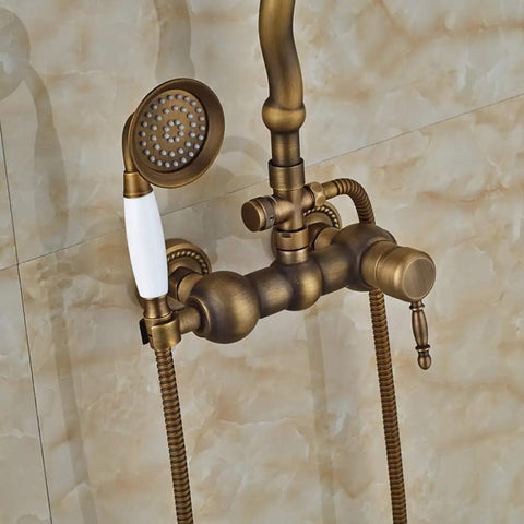 UMJIGF 8 Inch Antique Shower System with Hot and Cold Water Shower Combo Set Multifunction Single Handle Shower Faucet Set with Top Fall Shower Head, Handheld Shower,Type B,Type C close-up of bronze shower faucet with handheld attachment