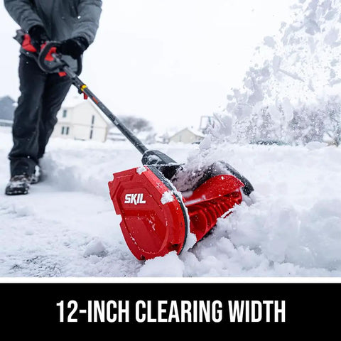 Badass Brushless 40 Volt Cordless Snow Shovel Kit With A Meaty 12 Inch Deck clearing snow with 12-inch auger in use.