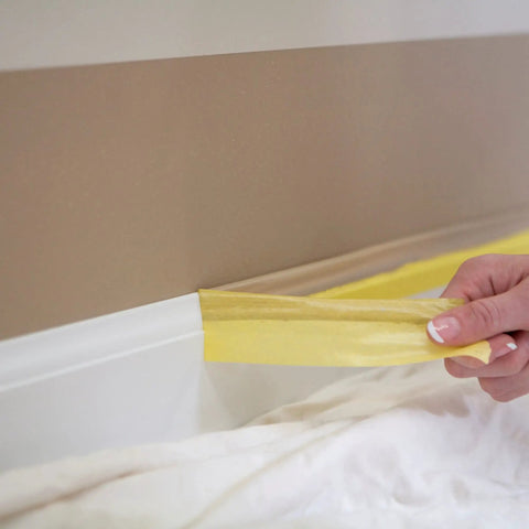 Applying Delicate Surface Painters Tape With PaintBlock Technology For Clean Lines On Fresh Paint Pro Grade DIY Friendly on trim