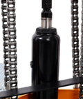 Close-up of Heavy Duty Hydraulic Manual Lift Stacker pump and chains, designed for lifting pallets and heavy materials.