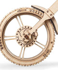 Wooden Mechanical Motorcycle DIY Kit With Rubber Band Engine Dope Vintage Bike Model For Vehicle Enthusiasts And Bikers Plywood Build With Wide Rear Wheel Prime Gift Idea, close-up of rear wheel