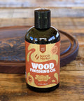 Straight Up Coconut Mct Wood Finishing Oil And Food Safe Cutting Board Sealer in an 8 oz bottle for sealing wooden surfaces.