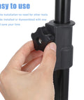 Hand adjusting Six Pack Five Sixteenths Inch Star Knobs With Female Threads Black Five Star Shaped on a metal pole