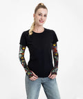 Top Tier Ice Silk Cooling Arm Sleeves With Bold Fantasy Prints worn by a woman in a black tee, ideal for outdoor activities.