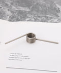 304 stainless steel torsion spring, part of Beefy Torsion Springs Set For Fireplaces With Sliding Doors, 4 Pack, 15mm OD, 2mm wire.