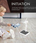 Child playing with toy airplane near Hands On Solar Windmill Kit For Kids Easy Assembly Mini Wind Turbine for science experiments.