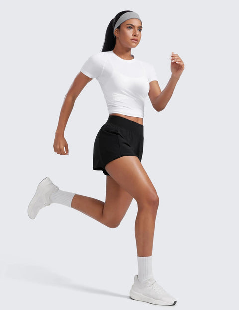 Woman running in Women Running Shorts Double Layer 3 Inch High Rise 2 In 1 Built In Spandex Short With Zip Pockets For Phone Tennis Workout Feathery Fit