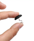 Heavy Duty Linen Head Twist Pins 30 Pack Black Fabric Ruffle Grips For Bedskirt Sofa Curtain Upholstery held between fingers.