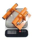 Rock Solid Heavy Duty Lifter Tool For DIY Pros And Construction Crews on digital scale, showing weight of 7.07 pounds.