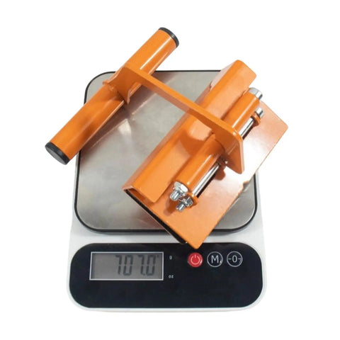 Rock Solid Heavy Duty Lifter Tool For DIY Pros And Construction Crews on digital scale, showing weight of 7.07 pounds.