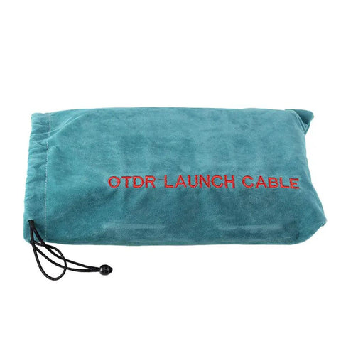 Teal carrying pouch with embroidered text 'OTDR LAUNCH CABLE', containing the OTDR Launch Cable Box 9 To 125 Single Mode With SC APC Connectors 1000 M Length Low Loss Under 0.5 dB Per Kilometer Dead Zone Eliminator Compact Rugged Box For On Site Work With Positive Seal Lock.