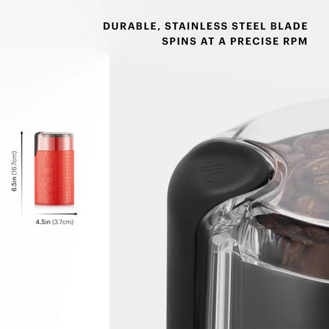 Snag This Sleek Electric Blade Coffee Grinder Featuring Durable Stainless Steel Blades Easy Push Button Control Crystal Clear Lid And Secure Cord Storage For Premium Daily Grinding In Bold Red side view with whole coffee beans visible