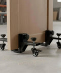 Smooth Sailing Door Panel Carrier Cart with adjustable clamp and steel frame supporting a wooden door on casters.