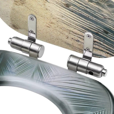 Heavy Duty Dual Pack Toilet Seats Featuring Soft Close Lid Solid MDF Build Slam Proof Hinges close-up view of stainless steel hinges