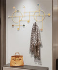 Heavy Duty Wall Mount Coat Hooks Built Tough With Premium Iron Metal sturdy yellow design holding a gray scarf on a wall.
