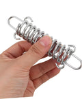 Hand holding spring from 3 Piece Adjustable Rope Buckle High Strength Spring Tensioner Set For Lightning Quick Tent Setup Lightweight Camping Gear