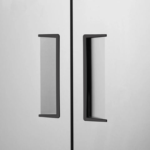 Industrial Grade 54 Inch Commercial Upright Refrigerator With Two Solid Doors And Plenty Of Space Keeping Your Goods Kickin Cold On The Regular For Bars Restaurants Or Shop Garages. Close-up of the solid doors with handles.
