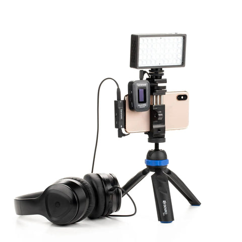 Setup with Lightning Audio Interface for iPhone and iPad With 3.5mm TRS and TRRS Mic Input on tripod with headphones and mic