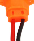 Close-up of Premium 3 Pin Charging Interface With Protective Cover Electric Vehicle Battery Cable in orange, red, and black.