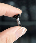 Close-up of hand holding 12T gear from Steel Alloy Helical Axle Overdrive Gear Set For 1 By 18 RC Crawlers Compatible With Redcat Ascent 18