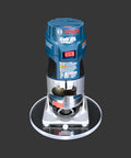 Heavy Duty 6 Inch Round Router Base Plate With Snappy Pre Drilled Holes Clear Acrylic Drop In Ready Fit For Bosch Colt Routers And Template Guides Made In USA Killer Woodworking Tool with Bosch Colt router on top.
