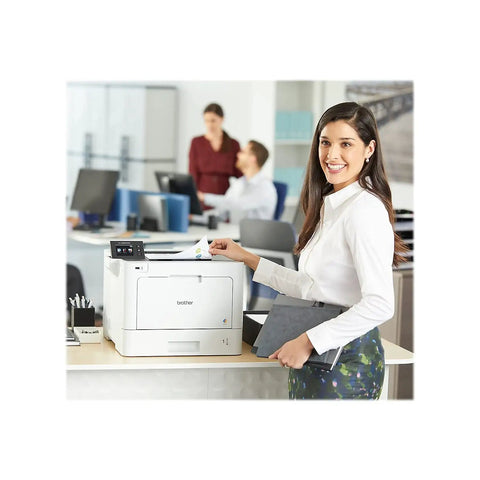 High Output Color Laser Printer With Frictionless Wireless Connection And Automatic Duplex Printing Optimized For Budget Conscious Buyers Who Want Serious Bang For Their Buck Daily in office setting with woman using printer.