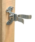 Installed 1 3 8 Inch Flat Back Wall Mount Fork Gate Latch For Chain Link Fence Posts on wooden post.