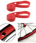 Beefed Up 26 Inch Rim Tape And Strips 20mm Elastic Nylon Red 2 Pack for road and mountain bikes shown on bike wheel.