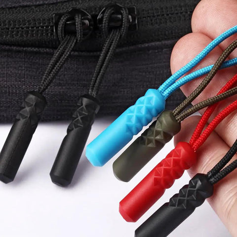 Close-up of On The Go Zipper Repair Rope Grab And Go Quick Fix For Broken Zippers, showing colorful cord puller tools