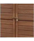 Lock mechanism on Massive Outdoor Storage Cabinet Crafted From Top Shelf Natural Cedar For Yard Gear And Hand Tools Weather Resistant Structure.
